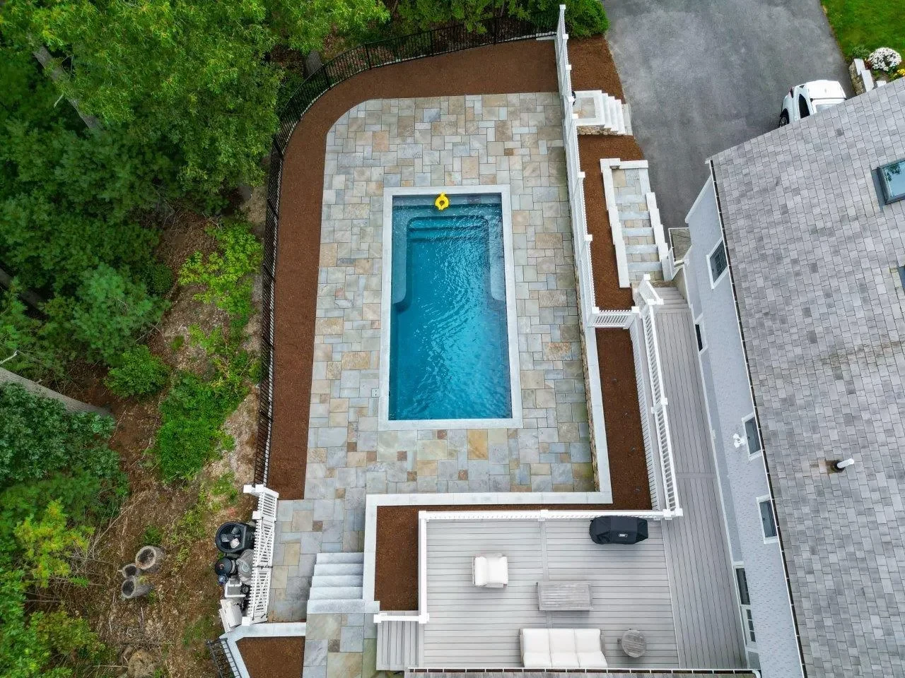 Straight-down aerial view of the Reske bluestone pool patio and deck layout