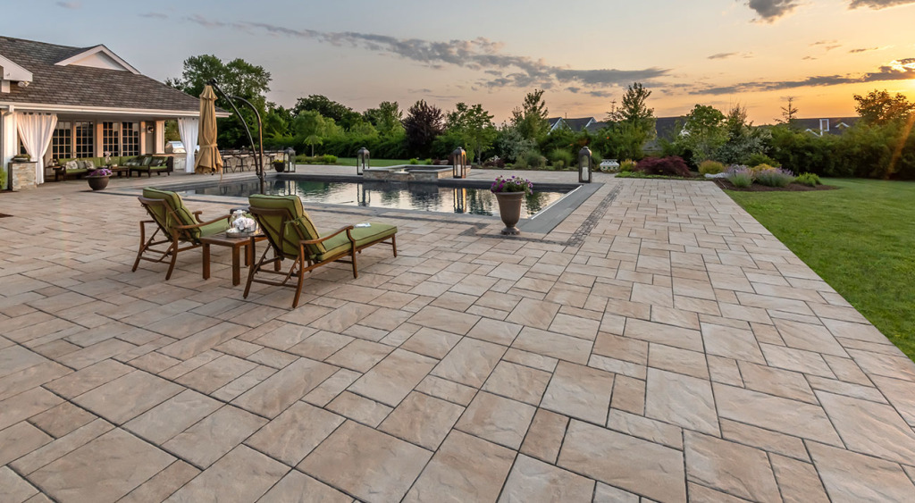 Beacon Hill Flagstone pool patio at sunset in Tuscany
