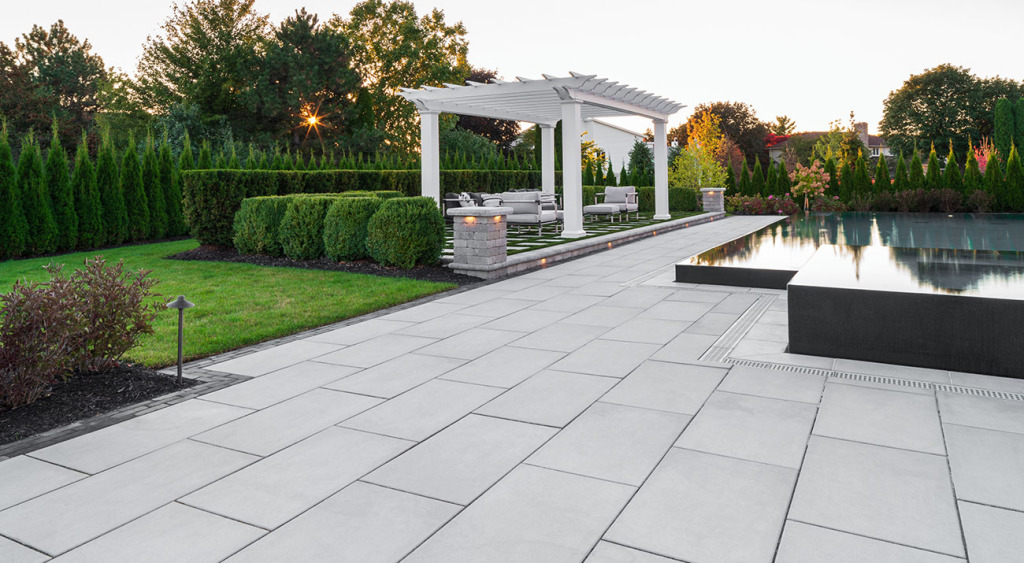 Beacon Hill Smooth patio with pergola and infinity pool
