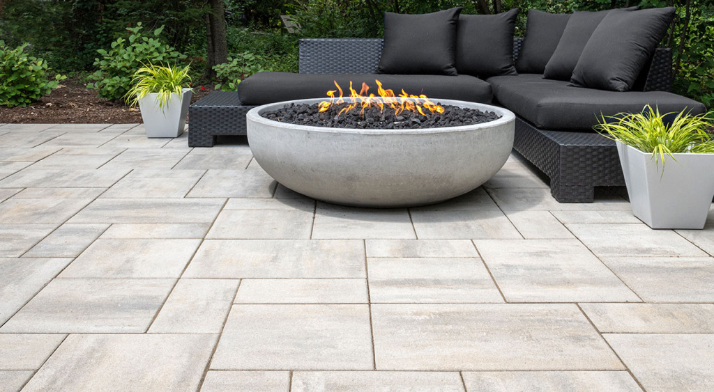 Beacon Hill Smooth paver patio with fire bowl and lounge seating