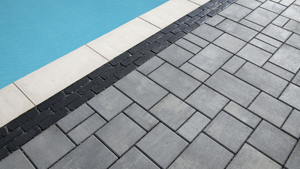 Treo Smooth pavers alongside a modern pool