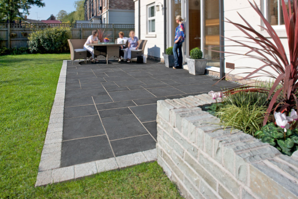 Limestone patio with garden seating area