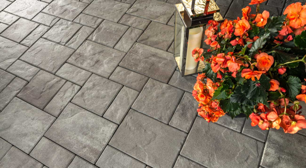 Treo Flagstone patio with lantern and begonias